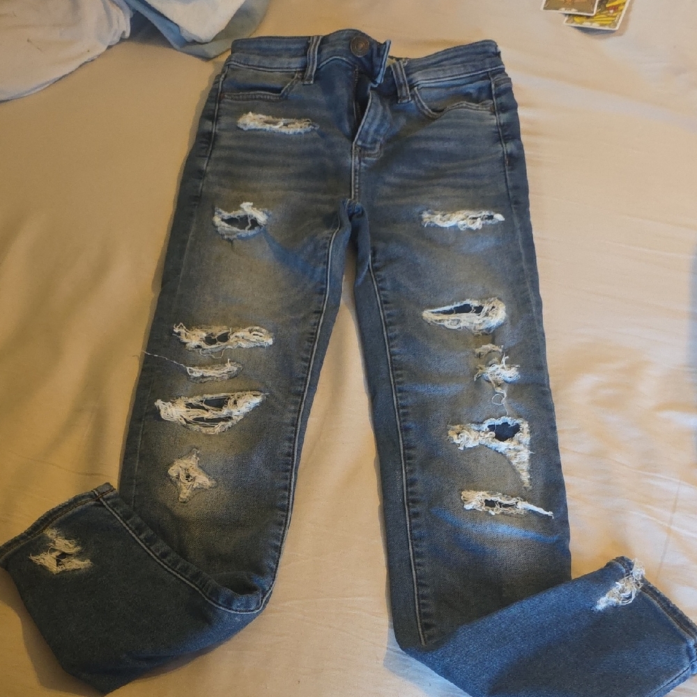 American Eagle Ripped Blue Skinny Jeans Next Level Stretch Size 0 26" Inseam